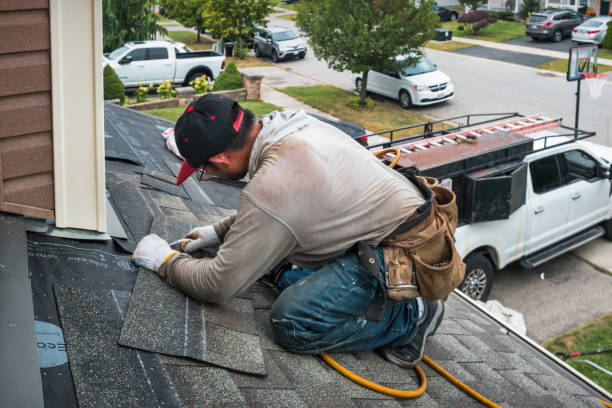 Professional Gutter Installation technician working in Cambridge, IL
